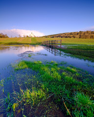 The flooded fields of St Hubert's Church at Idsworth, Hampshire