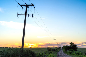Rural electrification is the process of bringing electrical power to rural and remote areas.  - obrazy, fototapety, plakaty