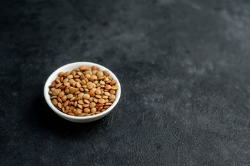 lentil in a plate on a stone background