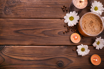 Coffee scrub on brown wooden background