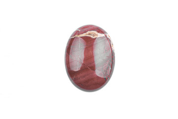 Oval brown cabochon stone on a white isolated background