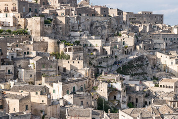 Fototapeta na wymiar Detailed view of the city of Matera in Italy at sunset. UNESCO World Heritage Site