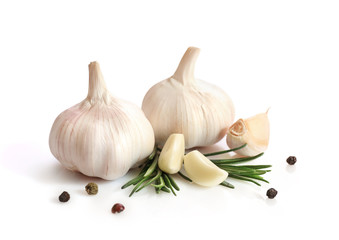 Garlic and rosemary isolated on white background