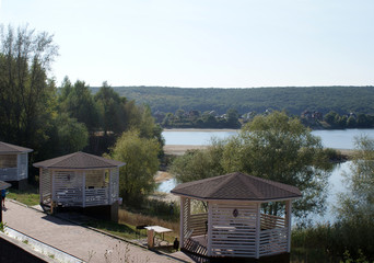 Garden furniture for relaxing in the forest by the river, wildlife.