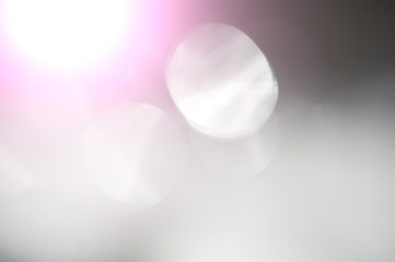 Abstract light gray background with white spots. For your design.