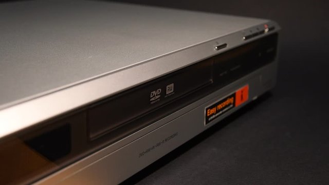 DVD player insert disc and close tray. Italy