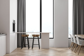 Panoramic white kitchen interior with bar