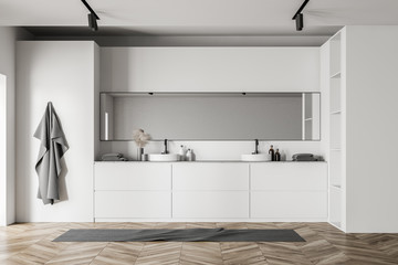White loft bathroom with double sink