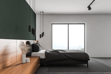 Green and white master bedroom interior