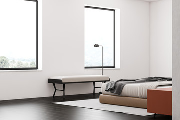 White master bedroom interior with bench