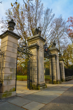 PRINCETON, NJ USA - NOVENBER 12, 2019: Stone column with eagle sculptures and wrought iron gate at the entrance to Princeton University. NJ USA