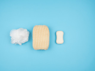 Accessories for washing away the mud with water on a blue background.
