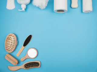 Personal hygiene items on a blue background.
