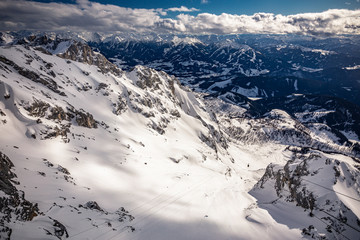 Fototapeta na wymiar The snowy winter panorama of Dachstein Alps, Austria