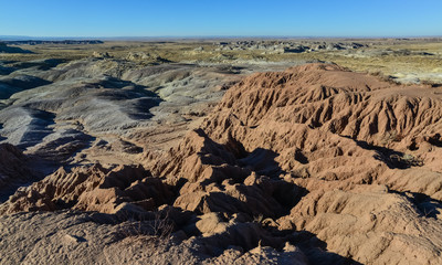 Fototapeta na wymiar Landscape, panorama of erosive multi-colored clay in Petrified Forest National Park, Arizona