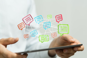 Digital icons with colorful dialog speech bubbles.