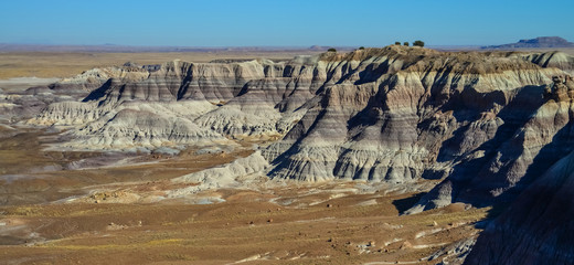 The Painted Desert on a sunny day. Diverse sedimentary rocks and clay washed out by water. Petrified Forest National Park, USA,  Arizona