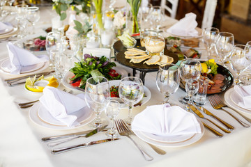 plates and dishes stand on the table for food