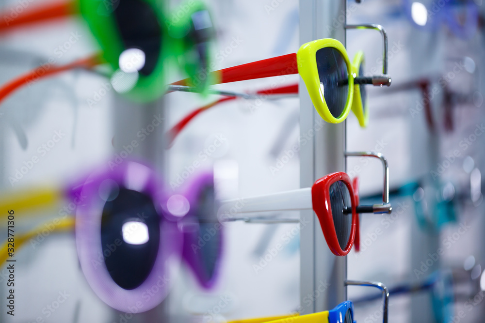 Wall mural sunglasses with a colored frame for children