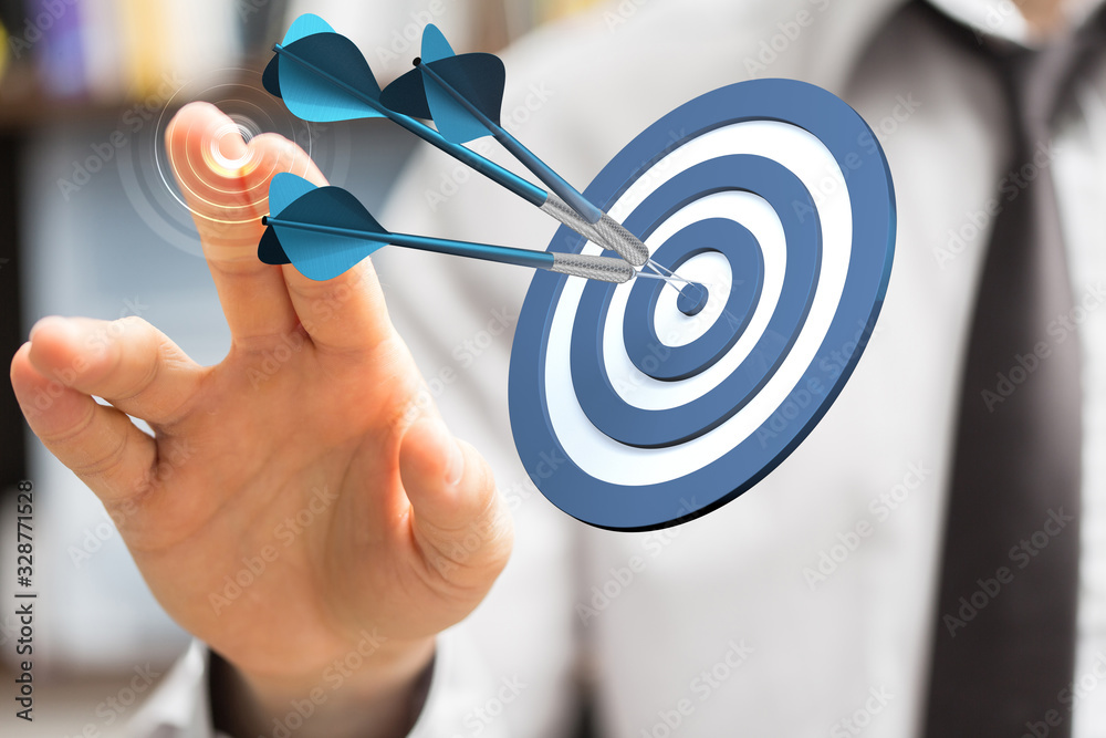 Aufkleber  makes a dart throw on the target. The concept of persistence in business..
