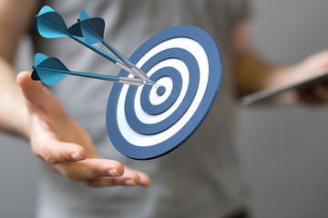 Dart arrow on target dartboard, Business success concept..