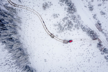 Fototapeta premium Sustaineable timber harvesting in Norway during wintertime