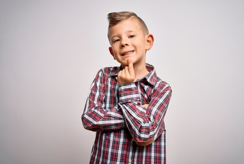 Young little caucasian kid with blue eyes wearing elegant shirt standing over isolated background looking confident at the camera smiling with crossed arms and hand raised on chin. Thinking positive.
