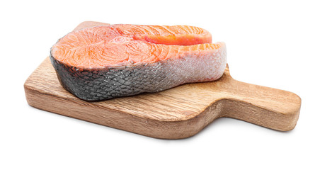 Raw salmon steak on white background