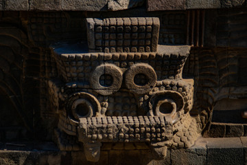 Mexican ancient historic sculptures in Quetzalcoatl temple at Teotihuacan, Mexico