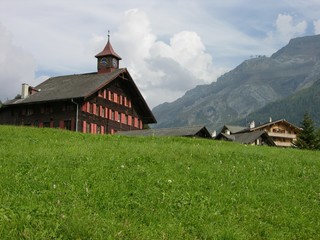 Les Diablerets, Switz., Traditional Building with Clock Tower