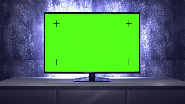 Smart TV mockup on a cabinet in front of a stylish highlighted grunge wall of a home cinema. Smooth zoom in camera movement, with green screen and tracking points to use your own video in it