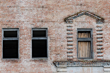 Fototapeta na wymiar Fragment of an old brick building