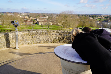loving couple of tourists in Blaye Citadel detail wall stone fortress in gironde France
