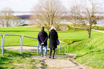 couple of tourists walk path Blaye Citadel unesco world heritage site in Gironde river France