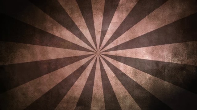Retro sun graphic element rotating In a grungy retro brown color mood. A seamless video loop. 