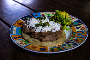 Delicious mexican recipe/food called gorditas/sopes.