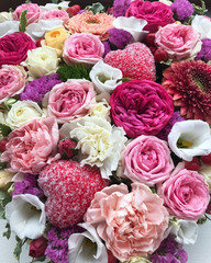 Beautiful, delicate, pink, large bouquet of flowers with a heart as a gift for the holiday. Roses, callas, peonies, gerberas