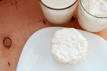 Cottage cheese, milk and sour cream. Healthy food. Dairy.