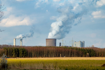 Fototapeta na wymiar Niederaußem, NRW, Germany, 07 03 2020, RWE coal fired power plangt Niederaußem, chimney with exhaust gases