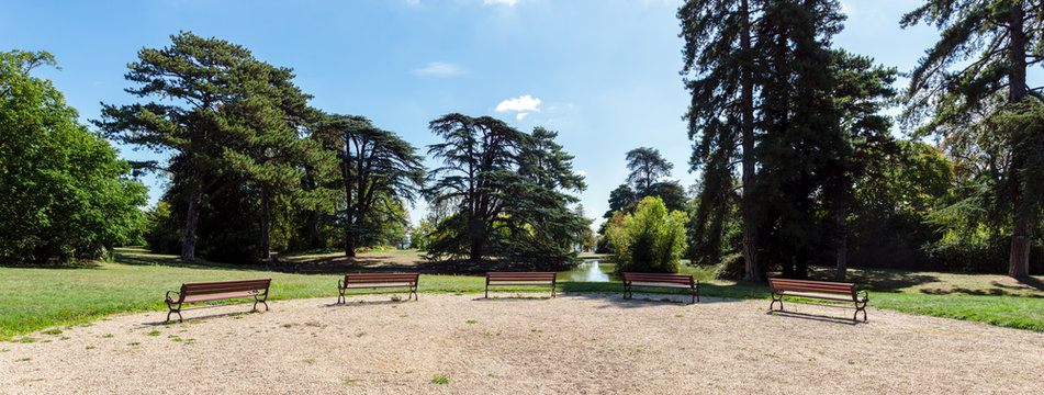 Empty benchs in Parc de Saint-Cloud in summer near Paris - France.