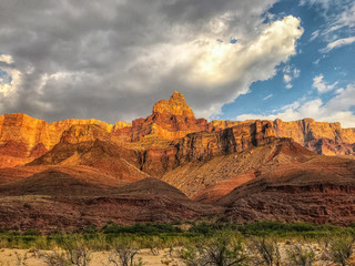 Fototapeta premium Colorado River view looking up to the Palisades of the Desert and Comanche Point. Pinacle peak at the Grand Canyon National Park, UNESCO World Heritage Site, Arizona