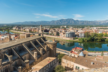 Fototapeta na wymiar View of Tortosa Cathedral and city buildings, Catalonia, Tarragona, Spain.