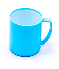 Plastic mug with blue color on white background