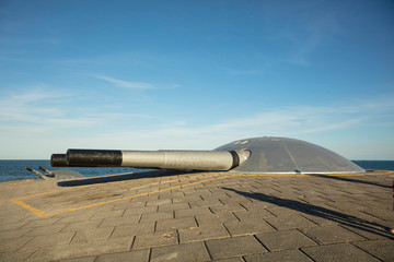 Fototapeta na wymiar Cannon of military fort and bunker with canons of defense at the end of Copacabana beach, in Rio de Janeiro