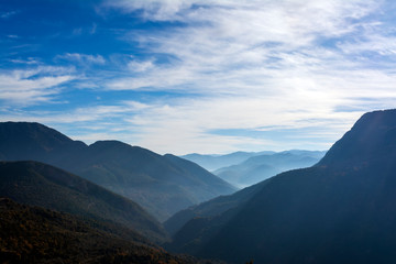 View of misty fog mountains in Arcadia, Greece