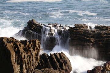 Waves hitting the shore in San Sebastian