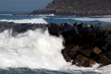 Waves hitting the shore in San Sebastian