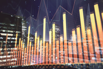 Financial graph on night city scape with tall buildings background multi exposure. Analysis concept.