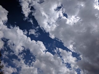 White Clouds on Dark Blue Sky