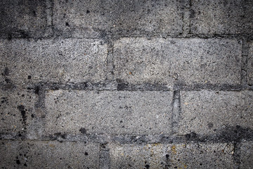 Texture of gray concrete blocks, detail of cement blocks, construction of buildings.